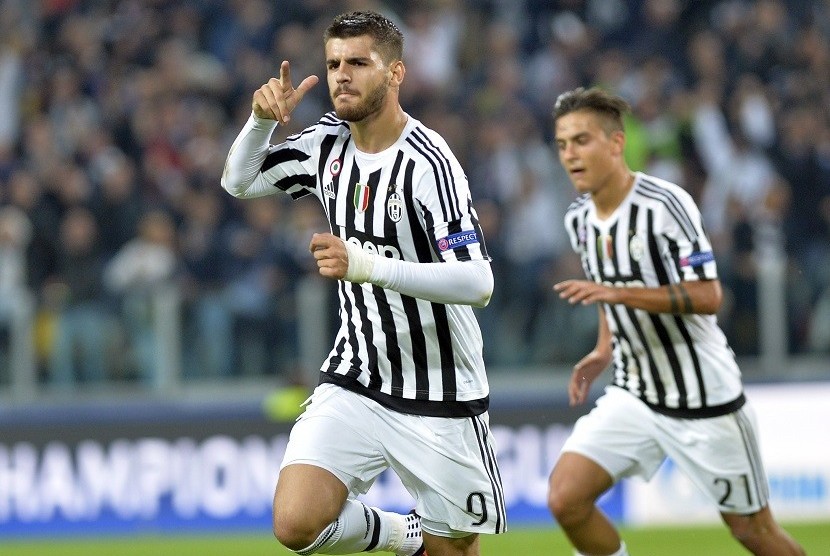 Alvaro Morata meluapkan kegembiraan usai menjebol gawang Sevilla dalam penyisihan Grup D Liga Champions dalam pertandingan yang digelar di Juventus Stadium, Turin, Italia, 30 September waktu setempat. 