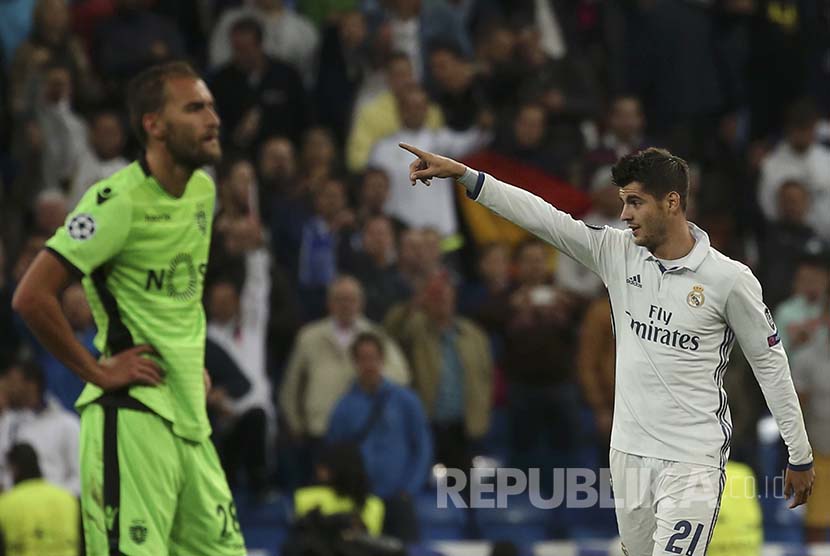 Alvaro Morata merayakan gol dalam pertadingan Liga Champions melawan Sporting Lisbon.