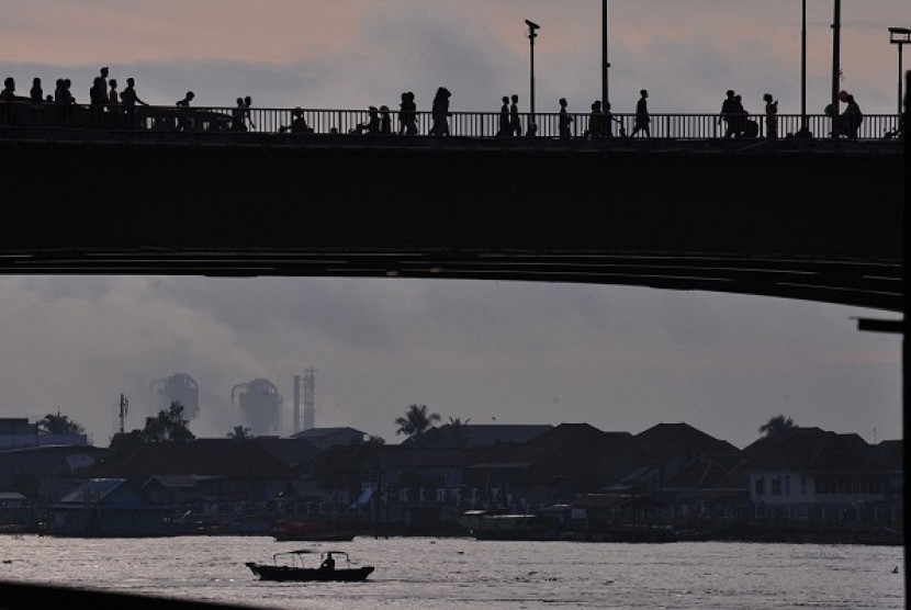 Ampera Bridge across Musi River in Palembang. (illustration)