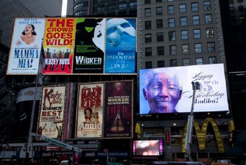 An electronic billboard announces Nelson Mandela's 95th birthday in New York's Times Square, Thursday, July 18, 2013. 
