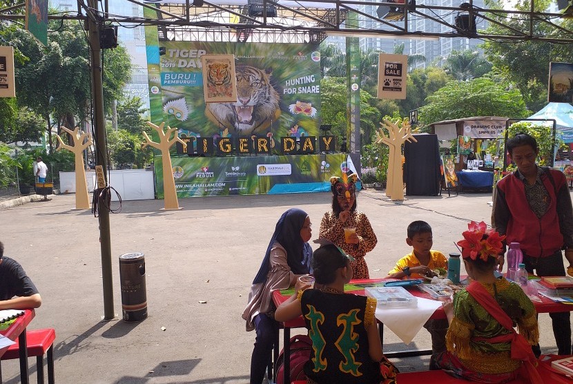 Anak-anak meramaikan Tiger Global Day 2019 di SCBD, Jakarta, Sabtu (27/7).