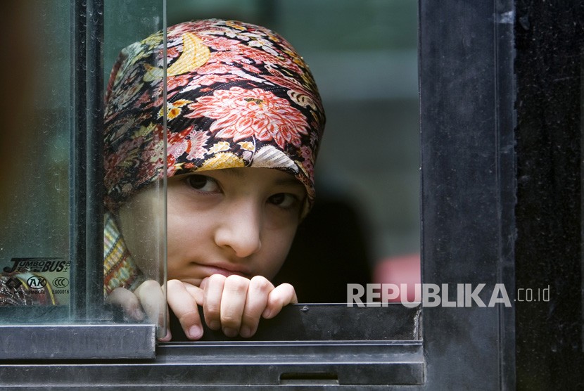 Anak muslim Uighur. Hasil penelitian menunjukkan China sudah melacak keberadaan Muslim Uighur sejak 2013. Ilustrasi.