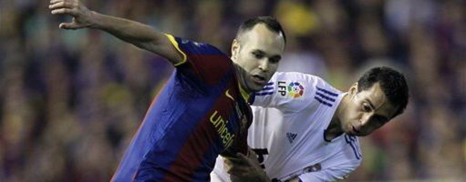 Andres Iniesta (kiri)