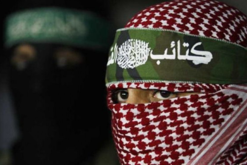Anggota Brigade Al Qassam, sayap militer Hamas. Brigade Al Qassam menyatakan siap melindungi rakyat Palestina, menggagalkan Israel menguasai Rafah.