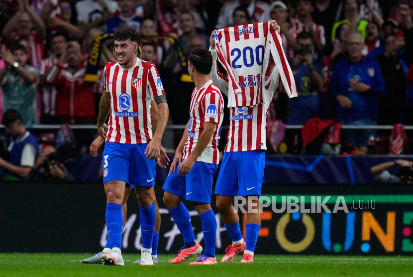 Antoine Griezmann merayakan golnya yang ke-200 untuk Atletico Madrid saat berlaga di Liga Champions melawan Eintracht Frankfurt, Rabu (1/10/2025) dini hari WIB..