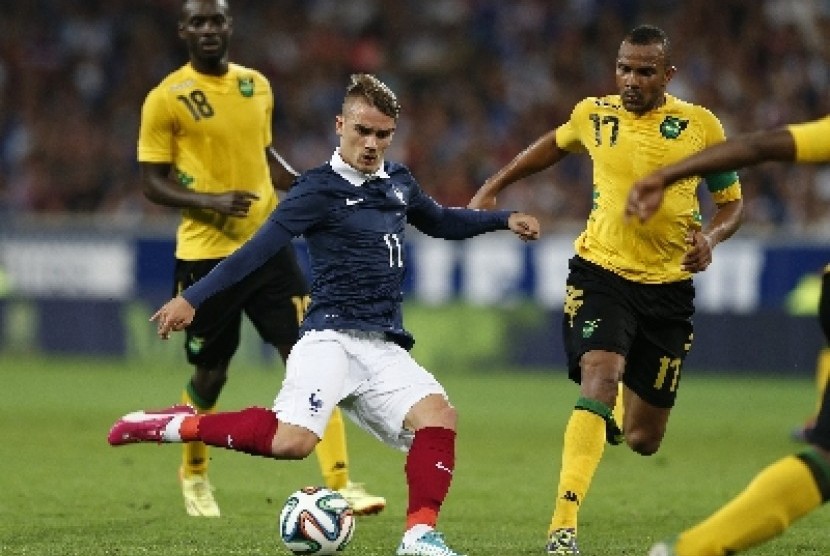 Antoine Griezmann (tengah).