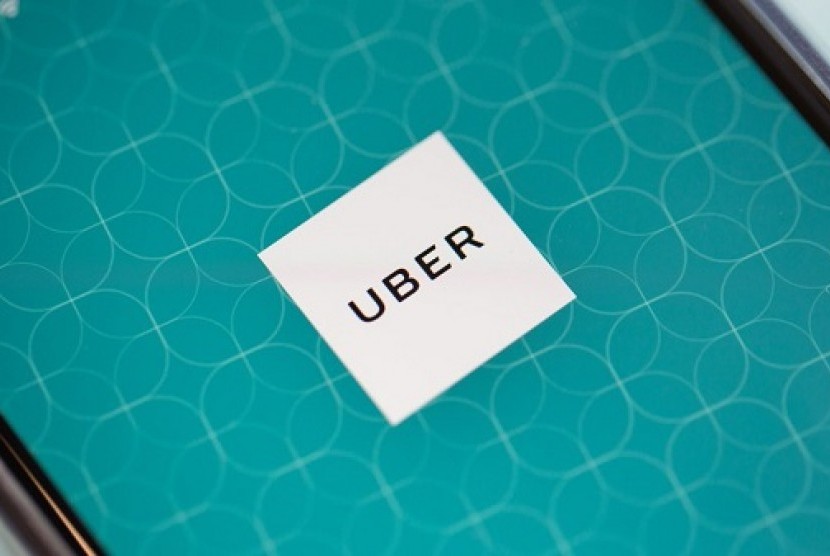 Aplikasi Uber. Uber Technologies Inc menyatakan, permintaan perjalanan meningkat secara bertahap.