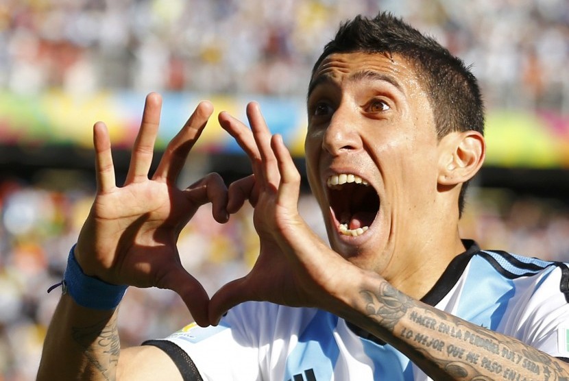 Argentina's Angel Di Maria celebrates scoring against Switzerland during extra time in their 2014 World Cup round of 16 game at the Corinthians arena in Sao Paulo July 1, 2014