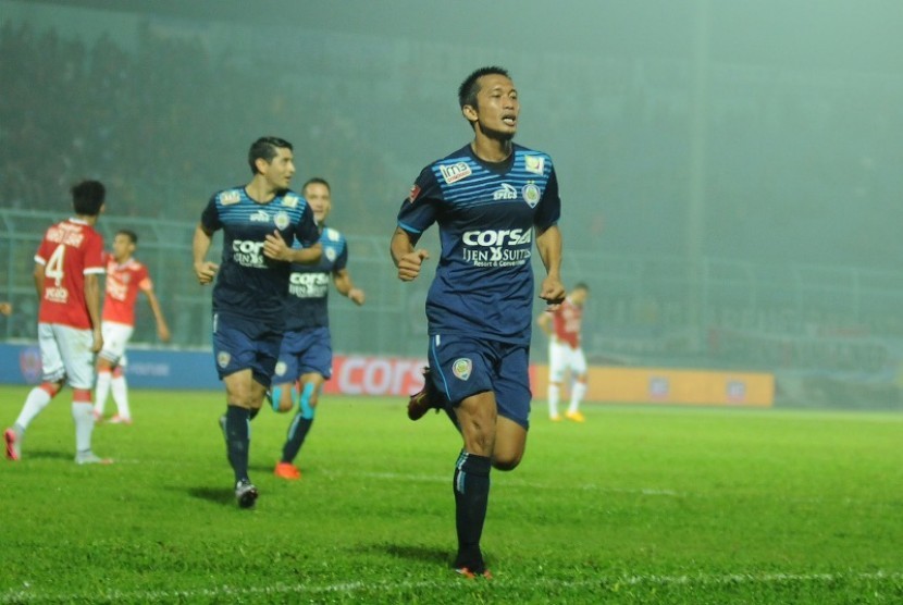 Arif Suyono merayakan golnya ke gawang Bali United