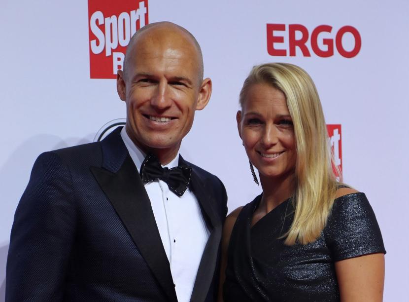 Arjen Robben bersama istrinya Bernadien Eillert.