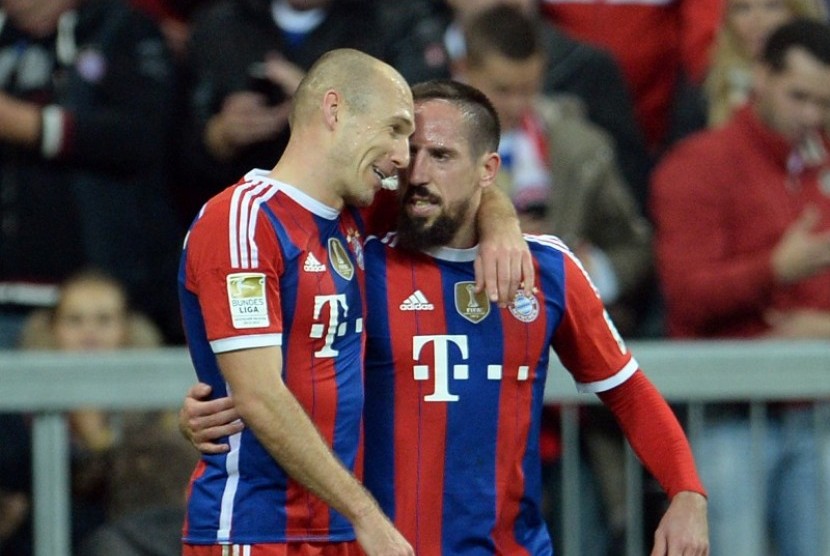 Arjen Robben (kiri) dan Franck Ribery