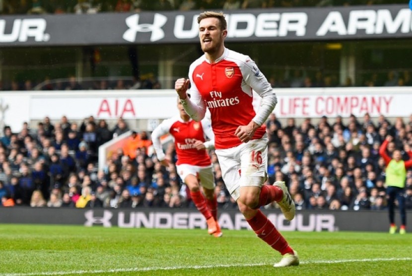 Ekspresi Aaron Ramsey usai mencetak gol ke gawang Tottenham Hotspur.