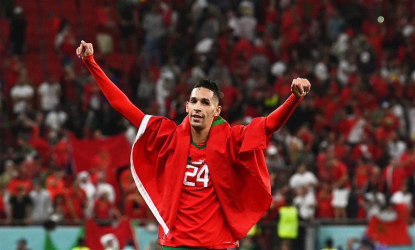 Badr Banoun dari Maroko merayakan setelah memenangkan pertandingan sepak bola perempat final Piala Dunia FIFA 2022 antara Maroko dan Portugal di Stadion Al Thumama di Doha, Qatar, Sabtu (10/12).