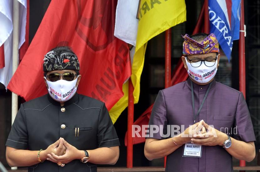 Komisi Pemilihan Umum (KPU) Kabupaten Badung, Provinsi Bali, secara resmi menetapkan I Nyoman Giri Prasta (kiri) I Ketut Suiasa (kanan) sebagai paslon terpilih.