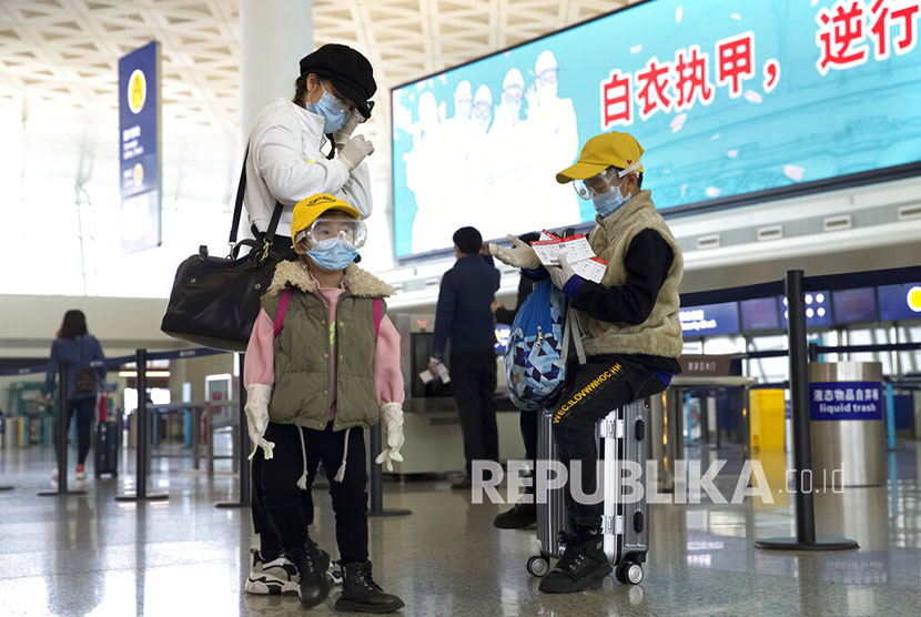  Bandara Wuhan Tianhe International Airport  di Wuhan, China. Delapan kota di China memangkas masa karantina sebagai persyaratan wajib bagi pengguna jasa penerbangan internasional. Ilustrasi.