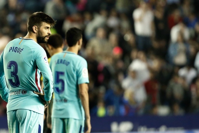 Bek Barcelona FC Barcelona Gerard Pique pada laga melawan Levante di Stadion Ciudad de Valencia, Senin (14/5) dini hari WIB. 