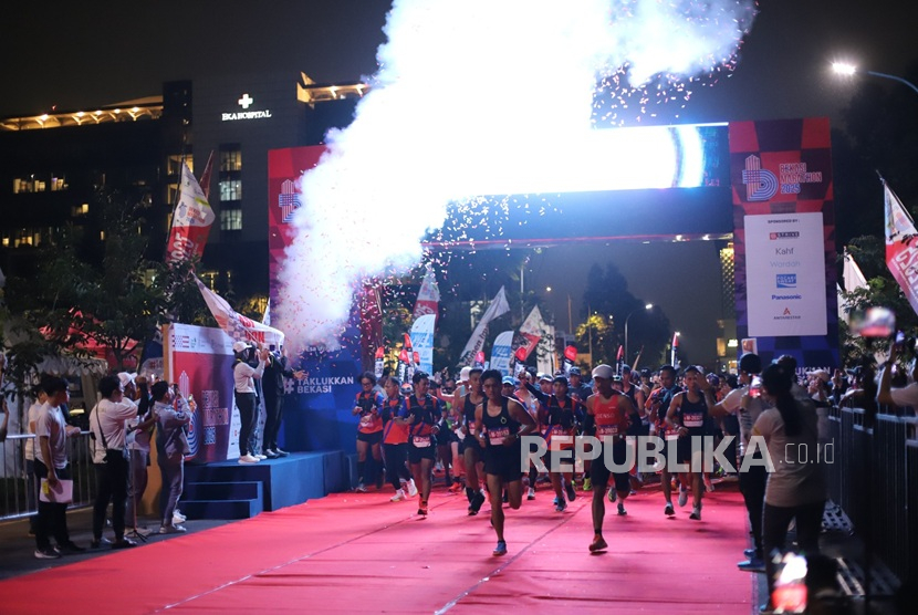  Bekasi Marathon 2025 kembali digelar di Kota Harapan Indah, Ahad (23/2/2025). Bekasi Marathon menghadirkan pengalaman lari yang tak terlupakan di tengah pemandangan asri dan fasilitas lengkap di township terbesar di timur Jakarta.