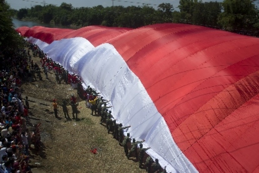 A giant red-and-white national flag. (Illustration)