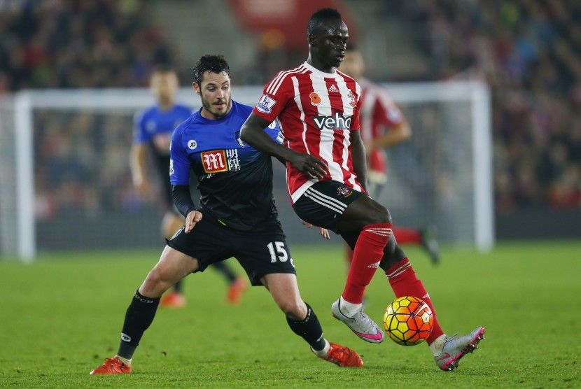 Bournemouth's Adam Smith in action with Southampton's Sadio Mane