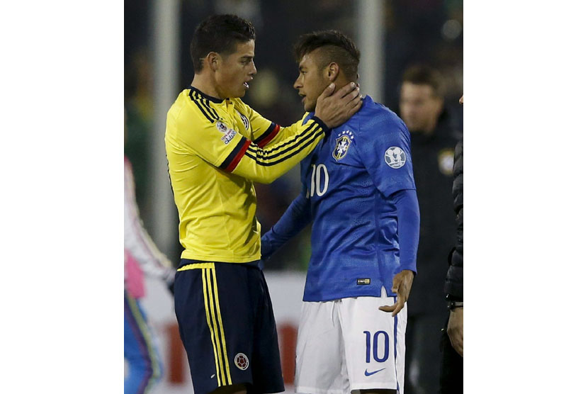 Brazilian striker Neymar Jr. (R) and Colombian midfielder James Rodriguez greet eachother at the end of the Copa America 2015 Group C match between Brazil and Colombia, at Estadio Monumental David Arellano in Santiago de Chile, Chile, 17 June 2015.