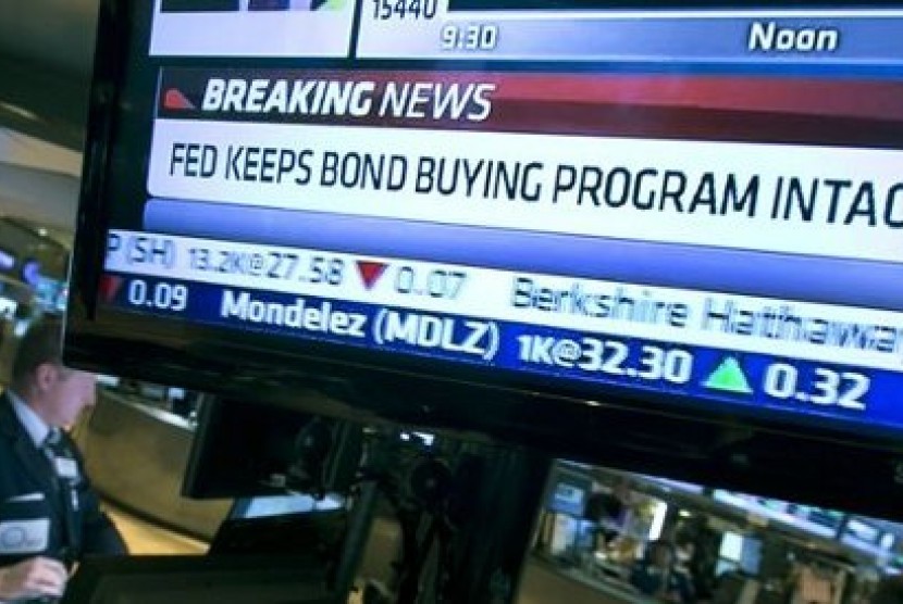 Breaking news di Wall Street tentang pengumuman bank sentral AS, The Fed, Kamis (19/9/2013) yang membatalkan pengurangan stimulus langsung direspon positif oleh pasar global.