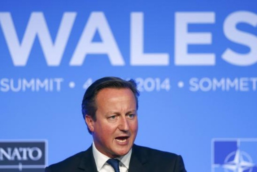 Britain's Prime Minister David Cameron speaks during a news conference on the second and final day of the NATO summit at the Celtic Manor resort, near Newport, in Wales September 5, 2014.