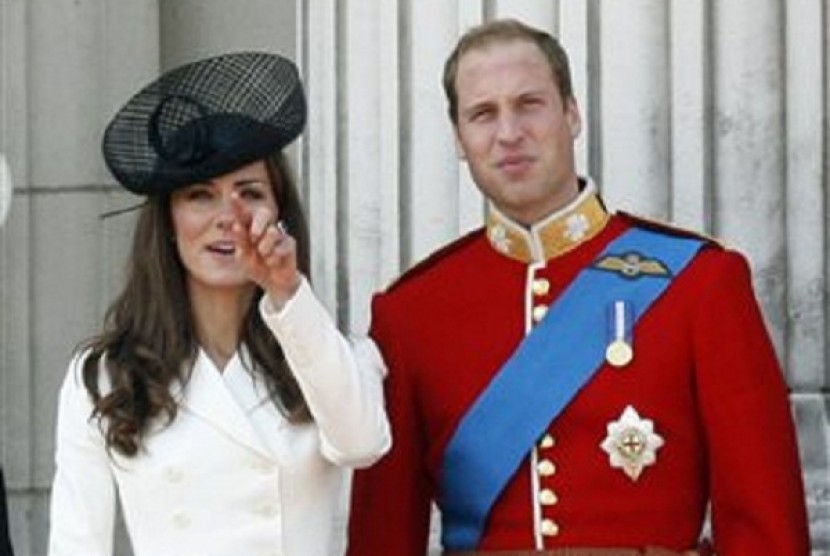   Britain's Prince William, Duke of Cambridge (right) is with his wife Catherine, Duchess of Cambridge, in London, in this, June 11, 2011