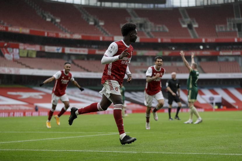 Pemain Arsenal Bukayo Saka merayakan gol ke gawang Sheffield United.