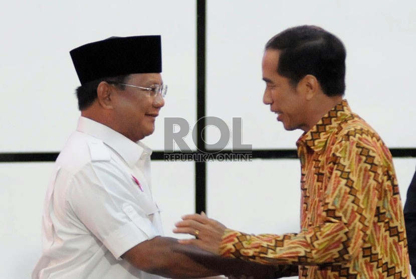  Calon presiden, Prabowo Subianto (kiri) dan  Joko Widodo (kanan).