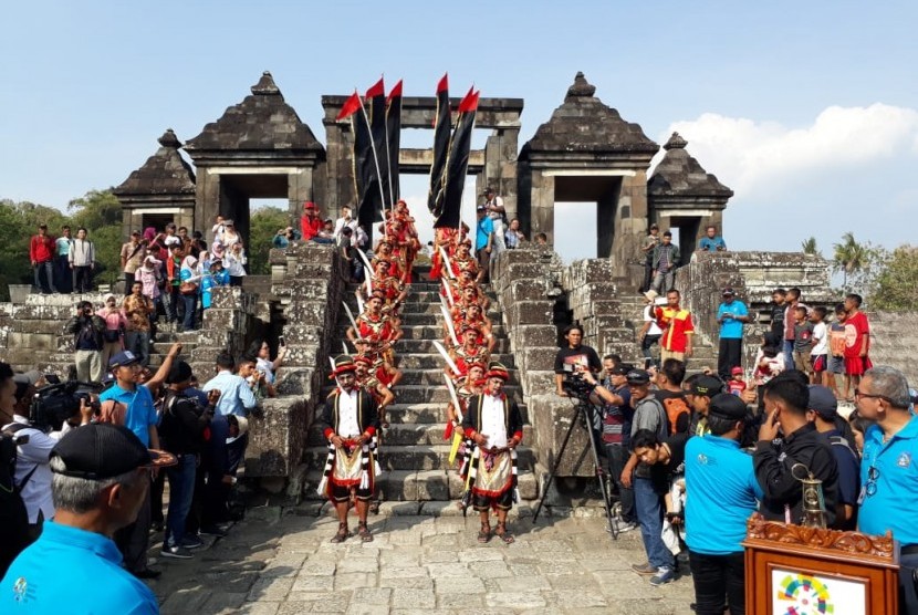 Bregodo troops welcome Asian Games' flame at     Ratu Boko Temple in Bokoharjo village, Prambanan, Sleman, Yogyakarta.