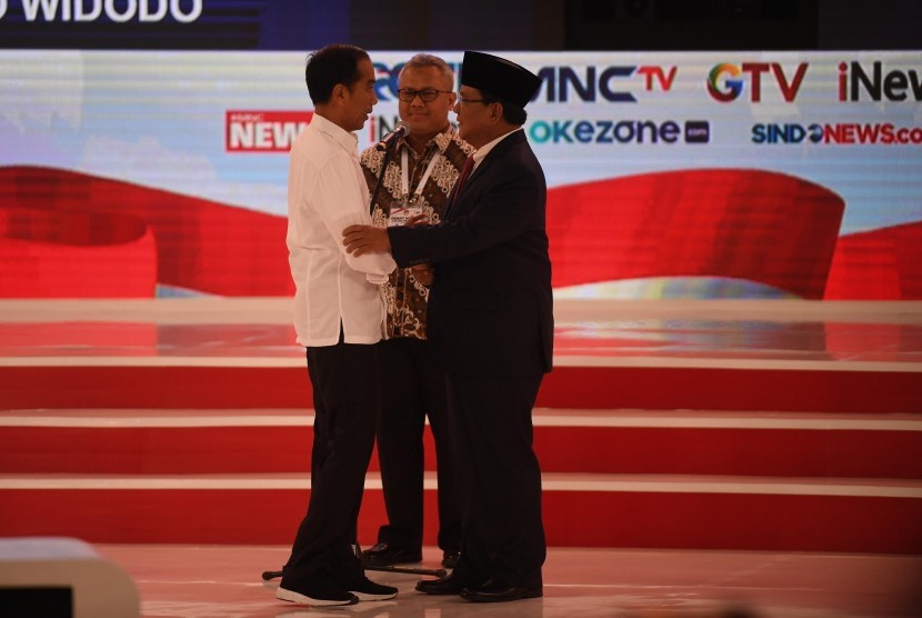 Incumbent President Joko Widodo (left) shakes hand with his contender Prabowo Subianto (right) at the second round of presidential debate held at Sultan Hotel, Jakarta, on Sunday (Feb 17).