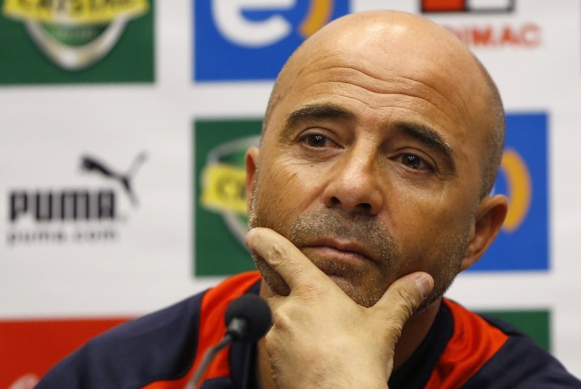 Chile's soccer team manager Jorge Sampaoli gestures, during a press conference at Wembley Stadium in London, Thursday, Nov. 14, 2013. England will play Chile in a friendly soccer match at the stadium on Friday. 