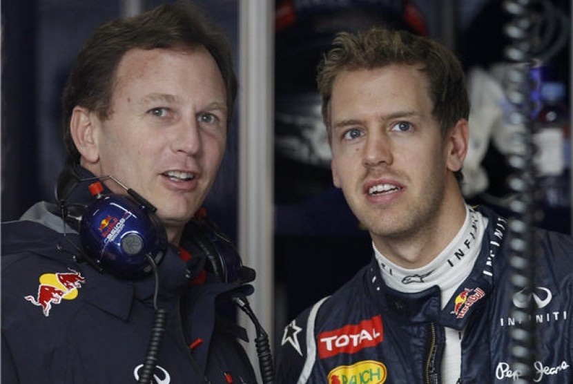 Red Bull menghargai keputusan Honda yang hengkang dari Formula 1 setelah musim 2021 (Foto: bos Red Bull, Christian Horner (kiri) dan Sebastian Vettel)