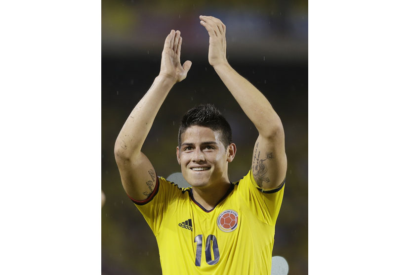 Colombia's James Rodriguez celebrates after a 2014 World Cup qualifying match against Ecuador in Barranquilla, Colombia, Friday, Sept. 6, 2013. Colombia won 1-0