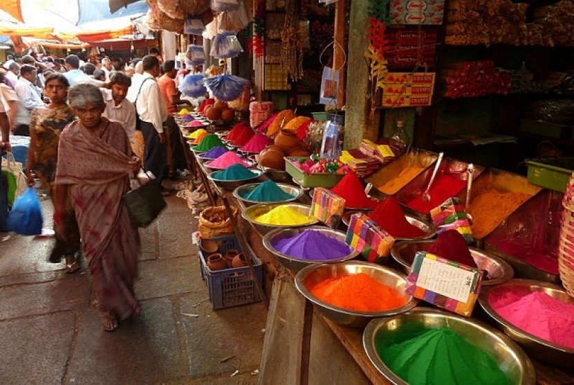 Colors Holi at a market in Mysore, India. People holds Holi festival in March every year. (illustration)