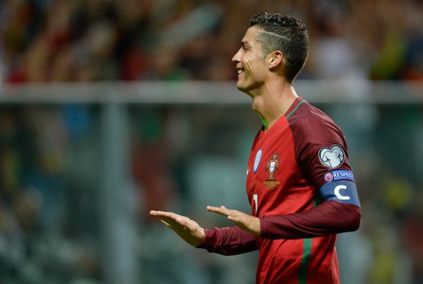 Cristiano Ronaldo ketika memimpin Portugal mengalahkan Kepulauan Faroe 5-1.