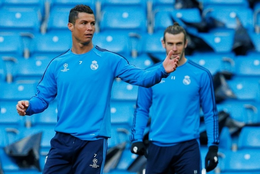 Cristiano Ronaldo (kiri) dan Gareth Bale