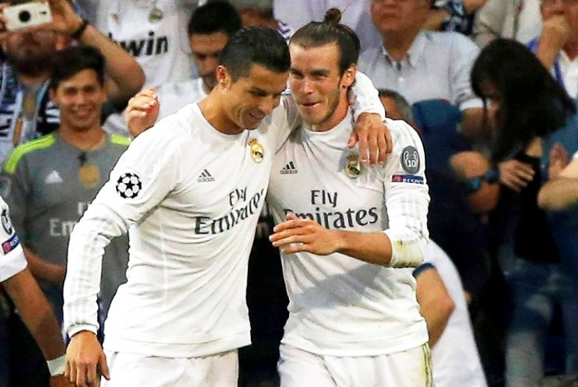 Cristiano Ronaldo (kiri) dan Gareth Bale.