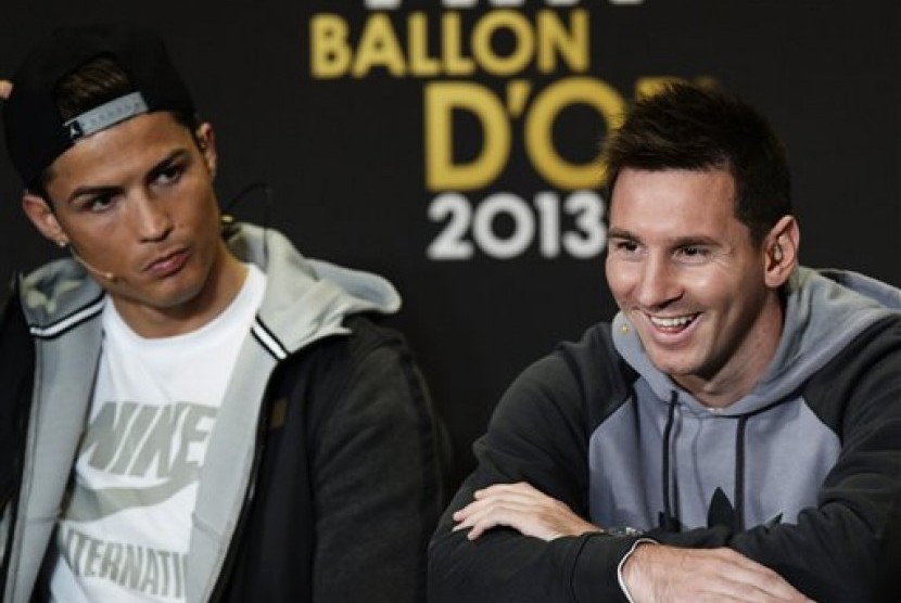 Cristiano Ronaldo (kiri) dan Lionel Messi (kanan)