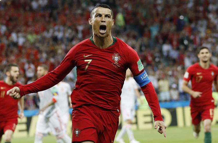 Cristiano Ronaldo Portugal merayakan gol pembuka timnya selama pertandingan grup B antara Portugal dan Spanyol di Piala Dunia sepak bola 2018 di Stadion Fisht di Sochi, Rusia, Jumat, 15 Juni 2018. 