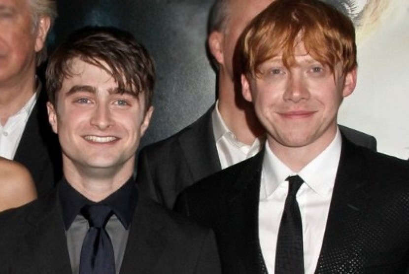Daniel Radcliffe (kiri) dan Rupert Grint