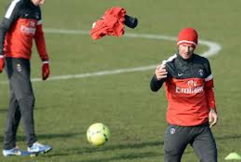 David Beckham saat menjalani latihan perdananya bersama skuat Paris Saint-Germain.