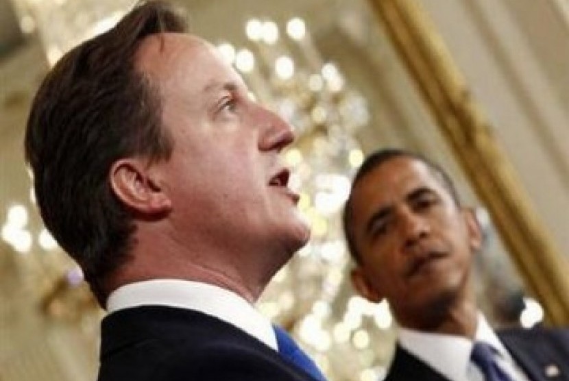 David Cameron saat menjadi tamu Presiden AS, Barack Obama.