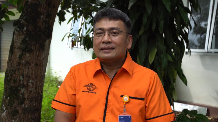 Direktur Bisnis dan Jaringan Keuangan PT Pos Indonesia Charles Sitorus. 