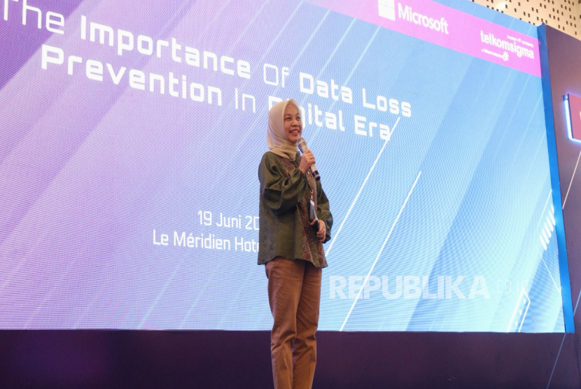 Direktur Utama Telkomsigma Dwi Sulistiani saat memberikan sambutan dalam acara Business Insight 