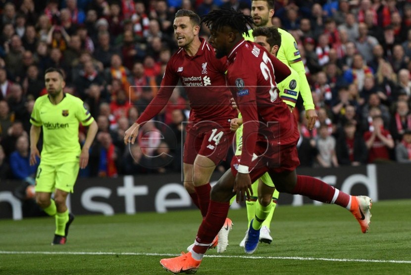 Divock Origi, penyerang Liverpool, membobol gawang Barcelona FC dalam pertandingan babak pertama leg kedua semifinal Liga Champions di Stadion Anfield, Liverpool, 7 Mei 2019. (kredit: EPA)