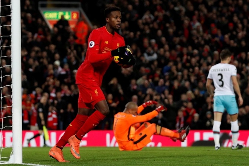 Divock Origi setelah menjebol gawang West Ham United.