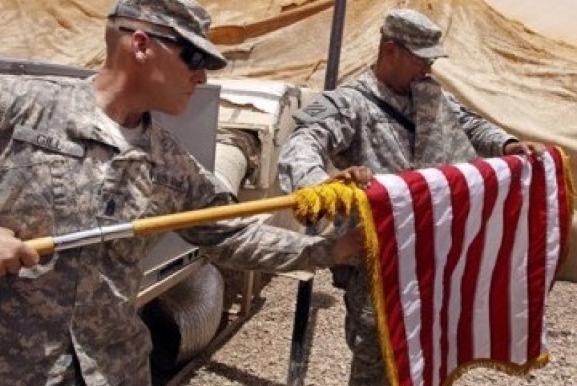 Iran melakukan serangan balasan ke pangkalan militer AS di Irak. Foto ilustrasi dua tentara AS di Irak. 