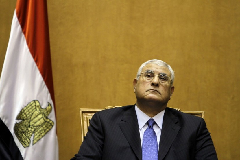 Egypt's chief justice Adly Mansour prepares to swear in as the nation's interim president Thursday, July 4, 2013.