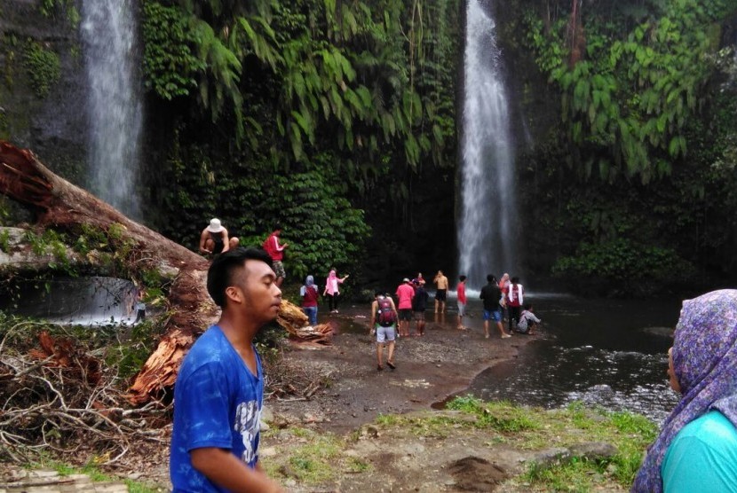 Eka Setia Putra, tour guide at Benang Stokel and Benang Kelambu waterfall at Aik Berik village.
